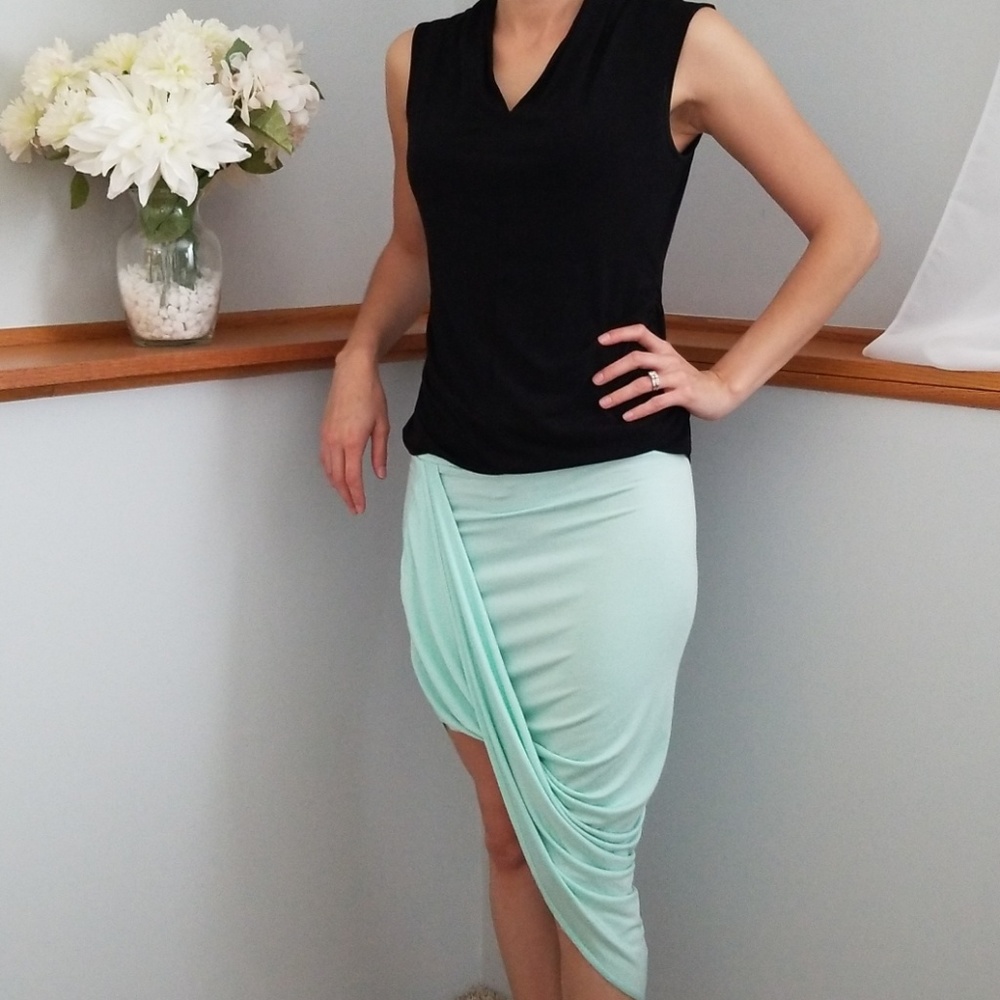 NWOT, CHARLOTTE RUSSE, teal asymetrical skirt!